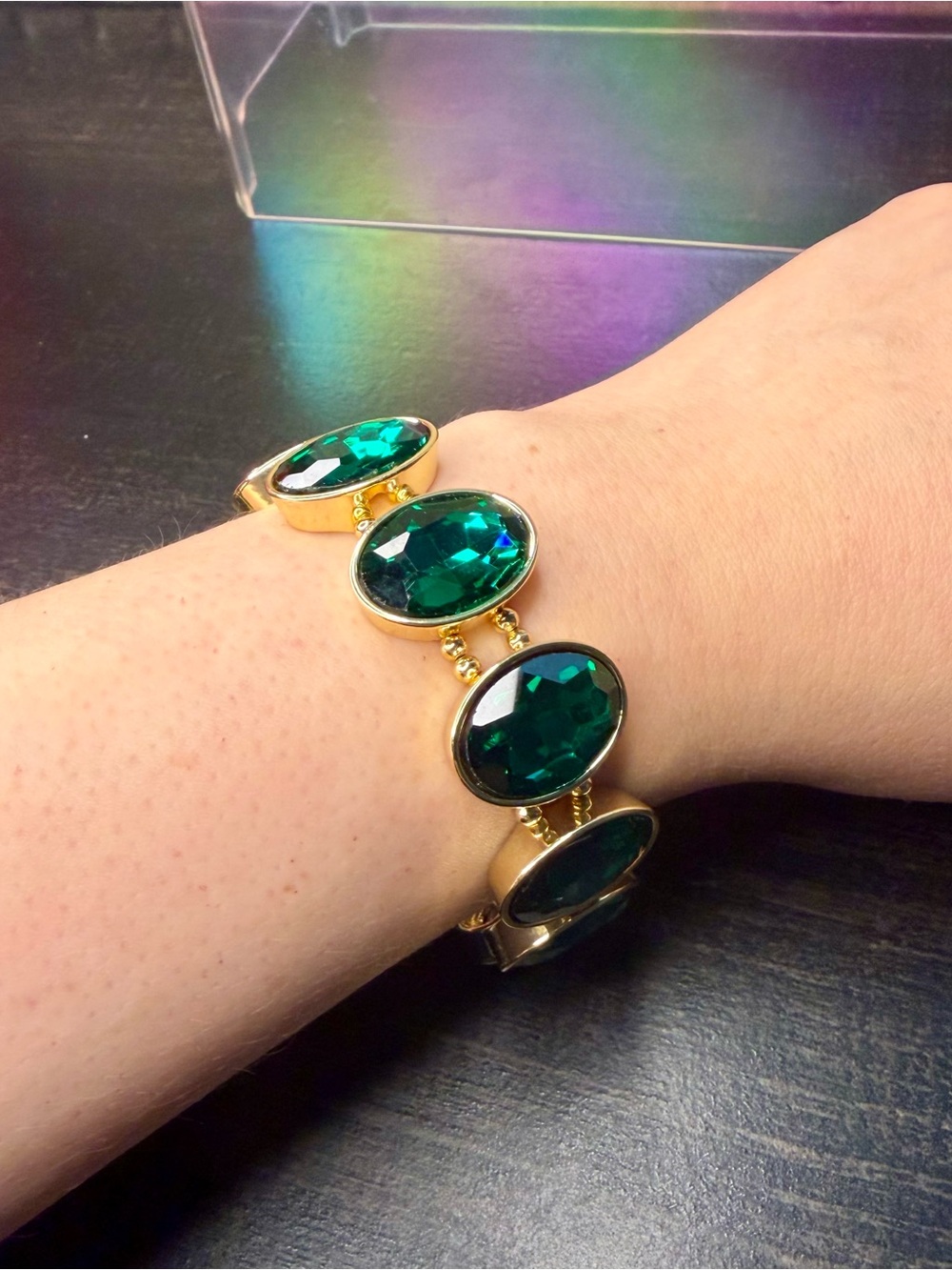 Gold-Tone Bracelet with Emerald Oval Stones